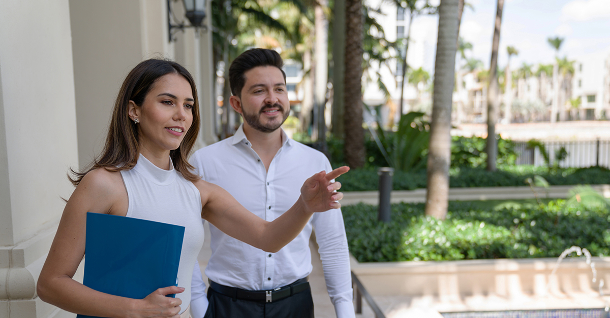 An agent showing a property to a client